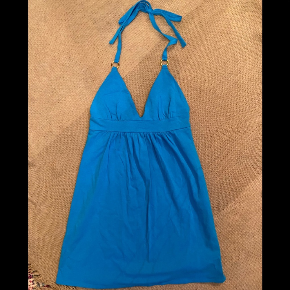 Blue halter dress with gold ring accent